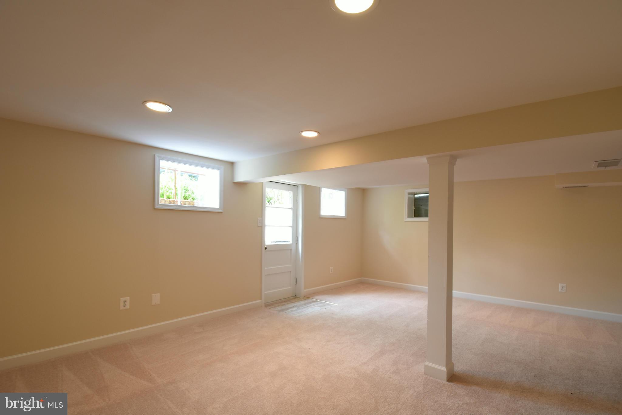 5607 Rolling Road Springfield, VA 22151 - Photo 22 of 30 a view of an empty room with a window