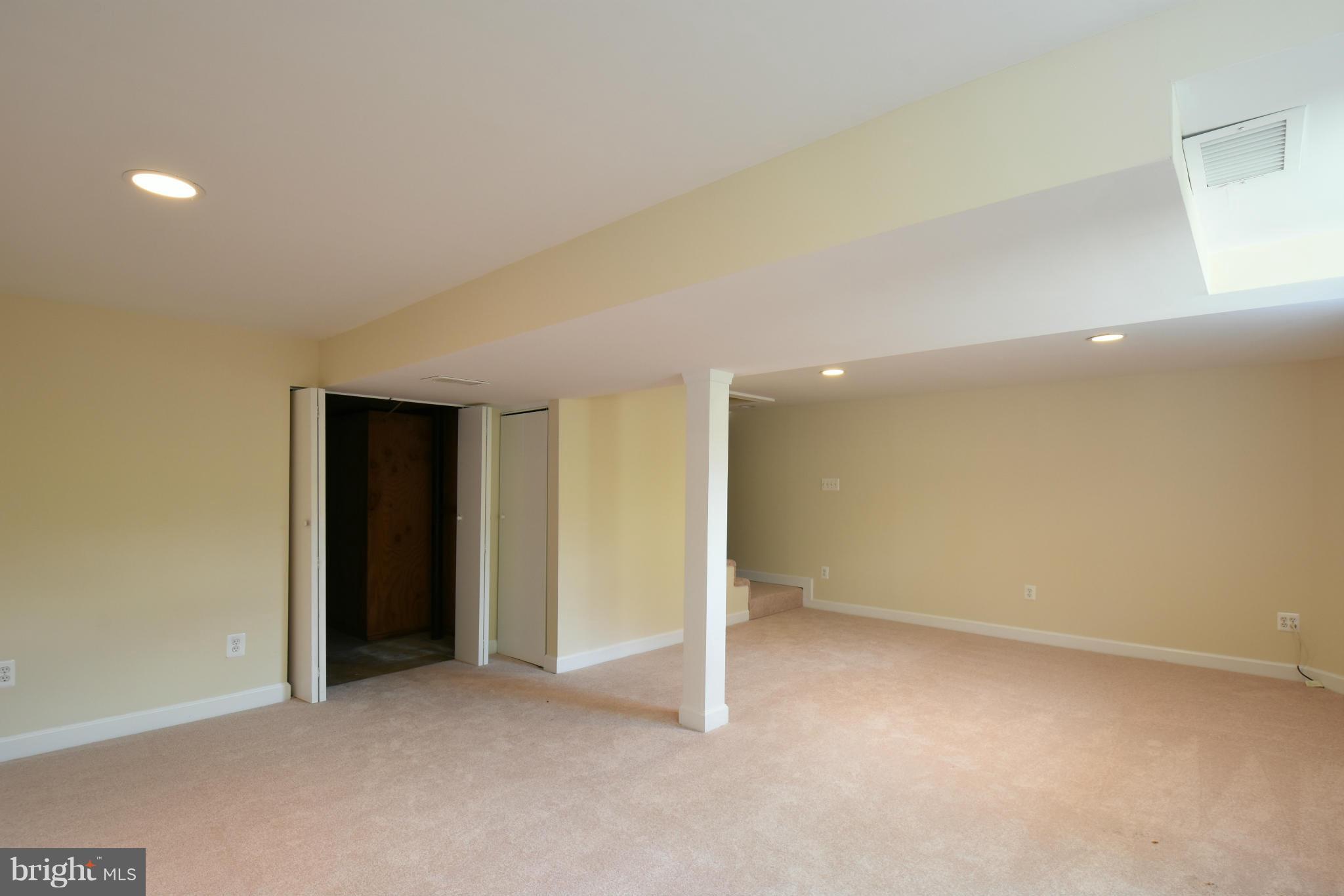5607 Rolling Road Springfield, VA 22151 - Photo 23 of 30 an empty room with closet area