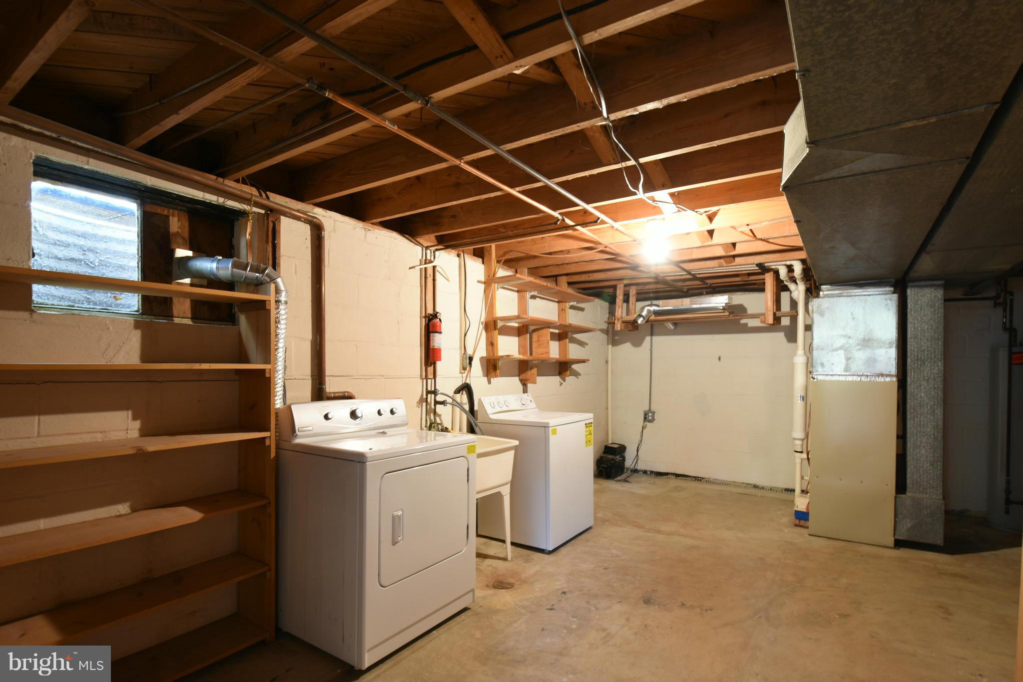 5607 Rolling Road Springfield, VA 22151 - Photo 25 of 30 a utility room with dryer and washer