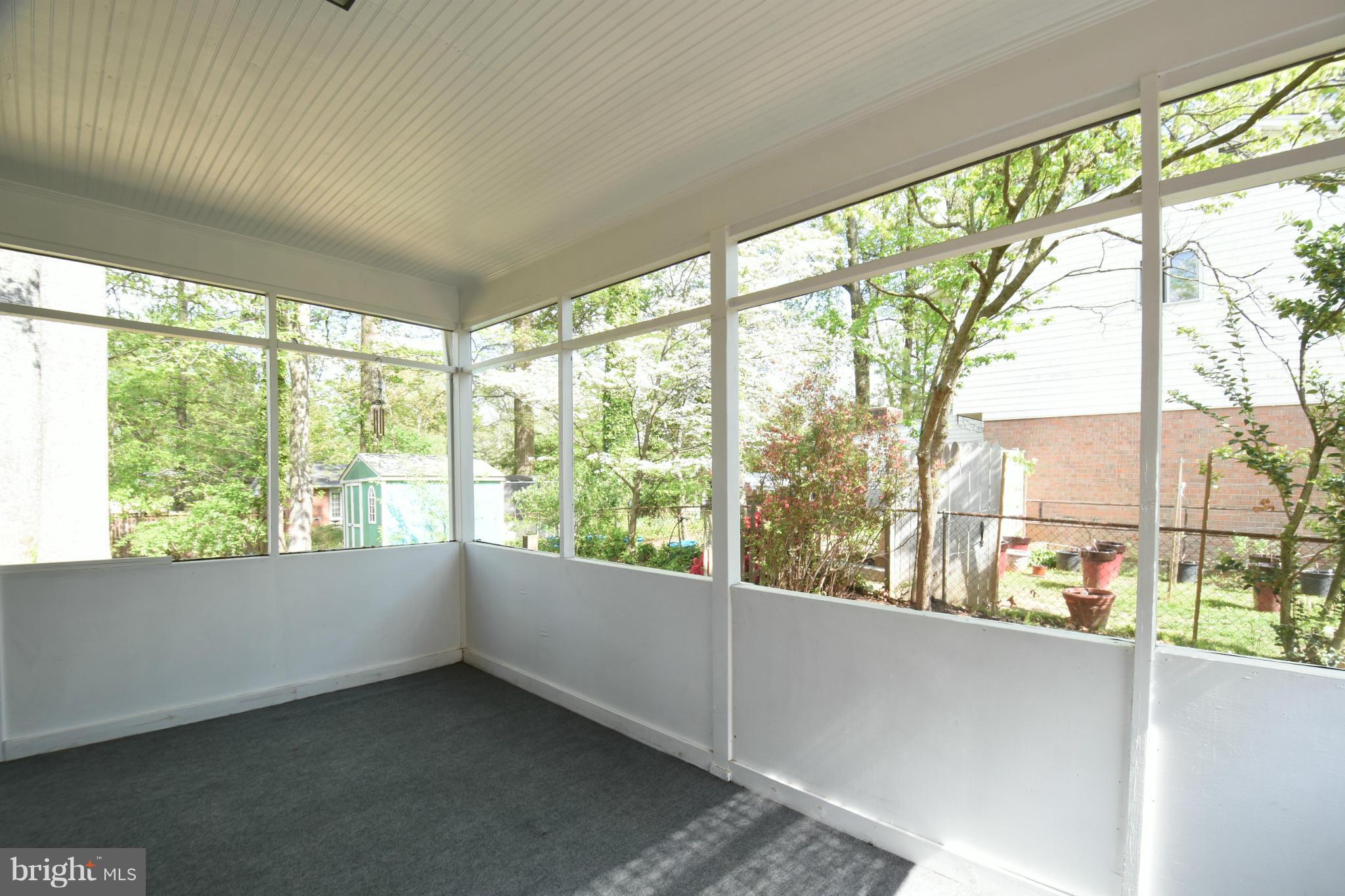 5607 Rolling Road Springfield, VA 22151 - Photo 27 of 30 a view of an empty room with a window