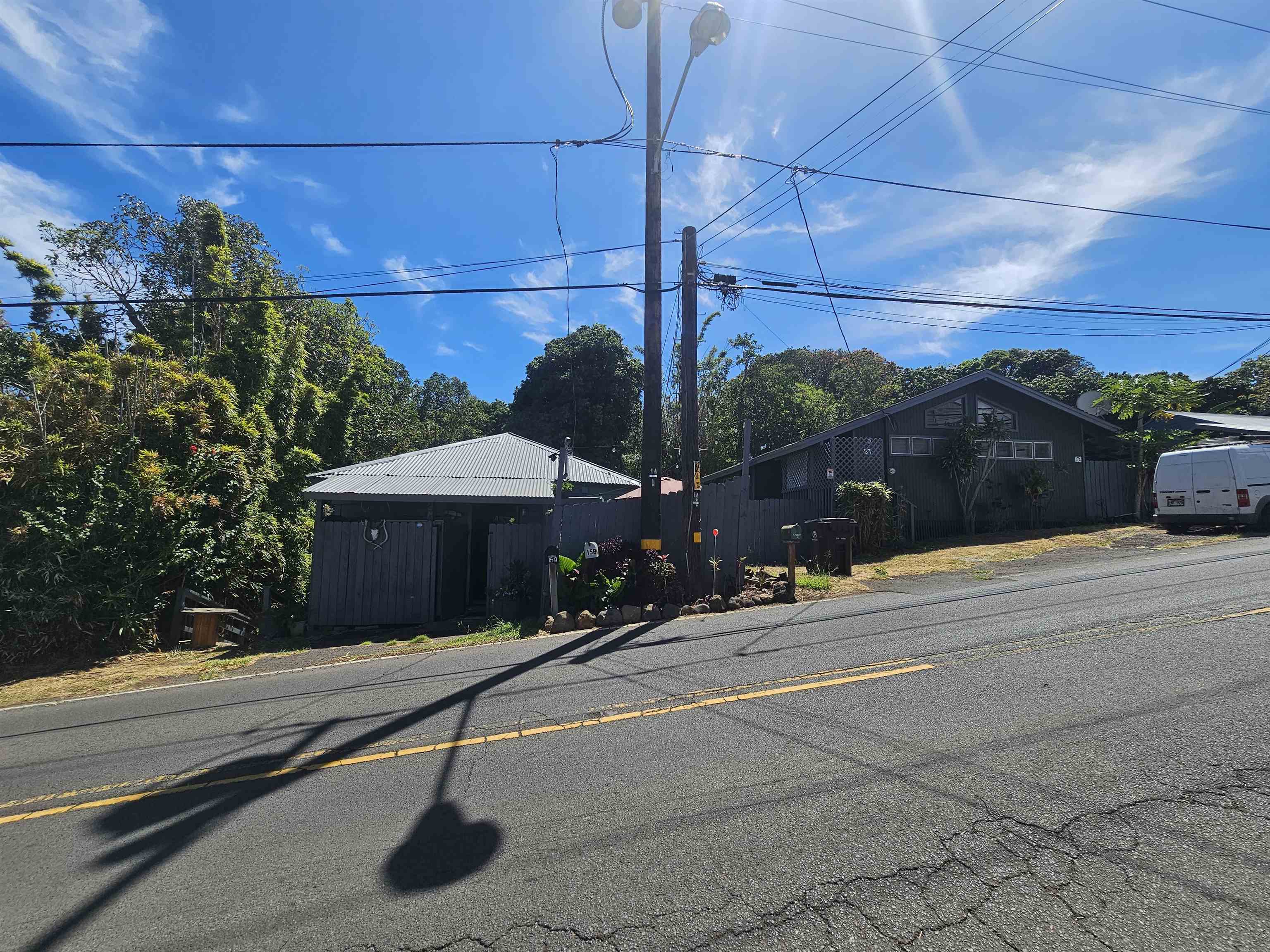 a view of a street with sitting area