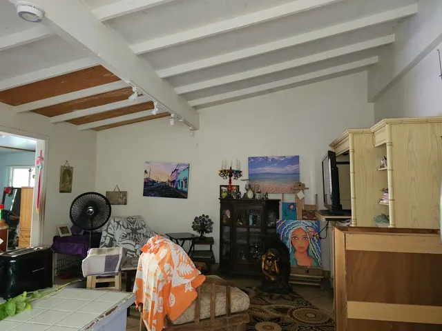 a kitchen with stainless steel appliances a refrigerator and a counter