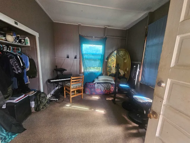 a kitchen that has a stove and a refrigerator