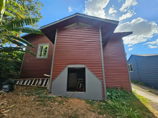 a front view of a house having yard