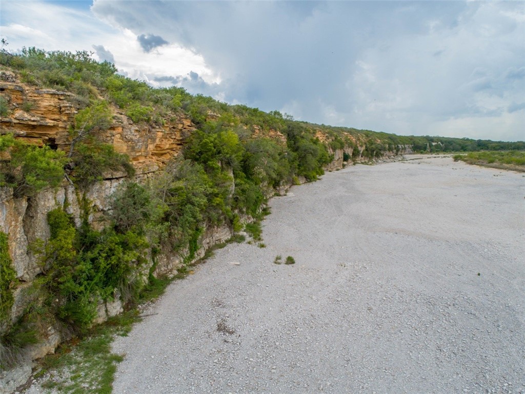 90 US 90 Uvalde, TX 78801 - Photo 1 of 1 a view of a pathway with a lake