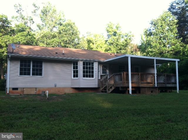 5130 Partlow Road Partlow, VA 22534 - Photo 6 of 10 a view of a house with backyard and garden