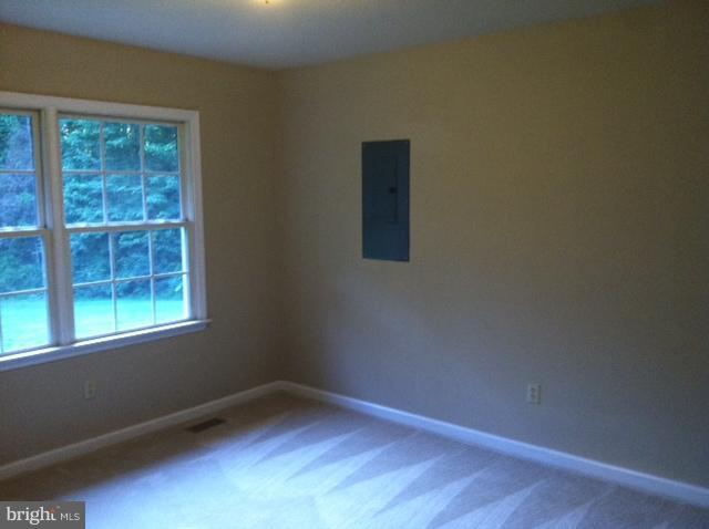 5130 Partlow Road Partlow, VA 22534 - Photo 8 of 10 an empty room with a window