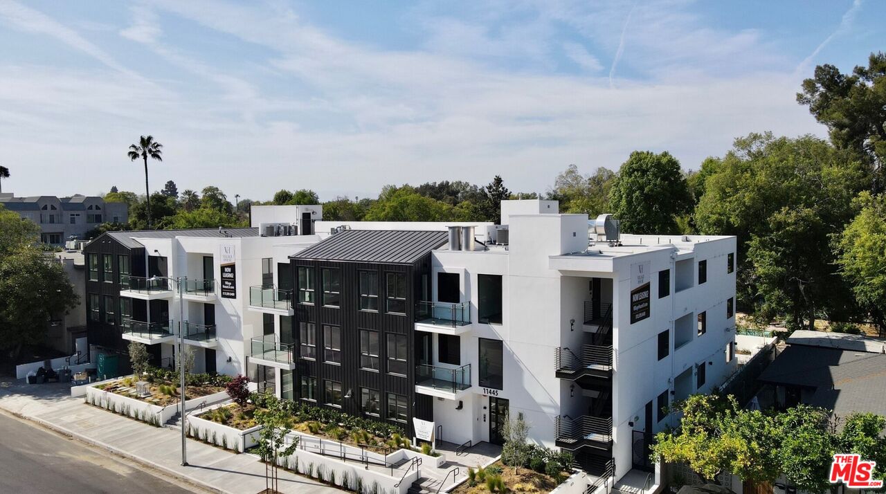 11445 Riverside Drive, Unit 101 North Hollywood, CA 91602 - Photo 1 of 21 a aerial view of multi story residential apartment building