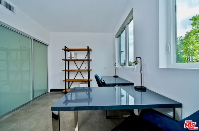 a view of a glass door and a glass door