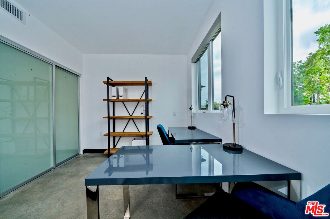 11445 Riverside Drive, Unit 101 North Hollywood, CA 91602 - Photo 12 of 21 a view of a workspace with furniture