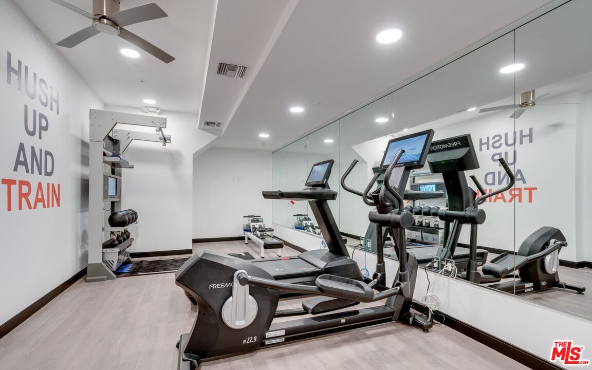 11445 Riverside Drive, Unit 101 North Hollywood, CA 91602 - Photo 16 of 21 a view of a room with gym equipment