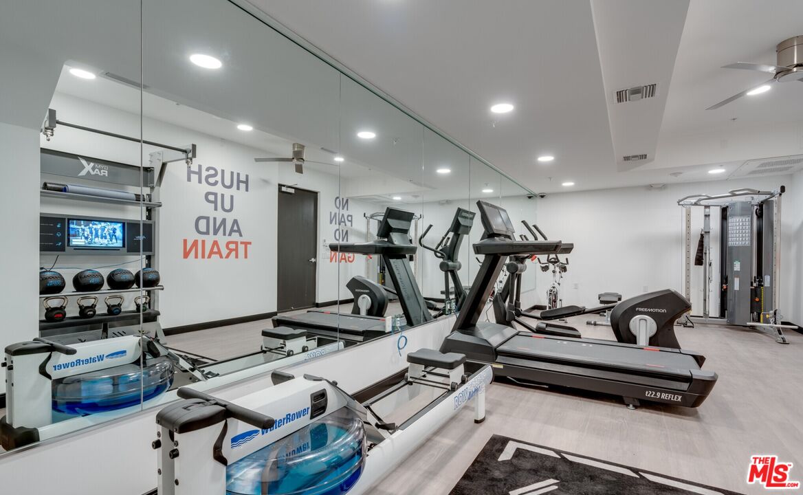 11445 Riverside Drive, Unit 101 North Hollywood, CA 91602 - Photo 17 of 21 a view of a room with gym equipment