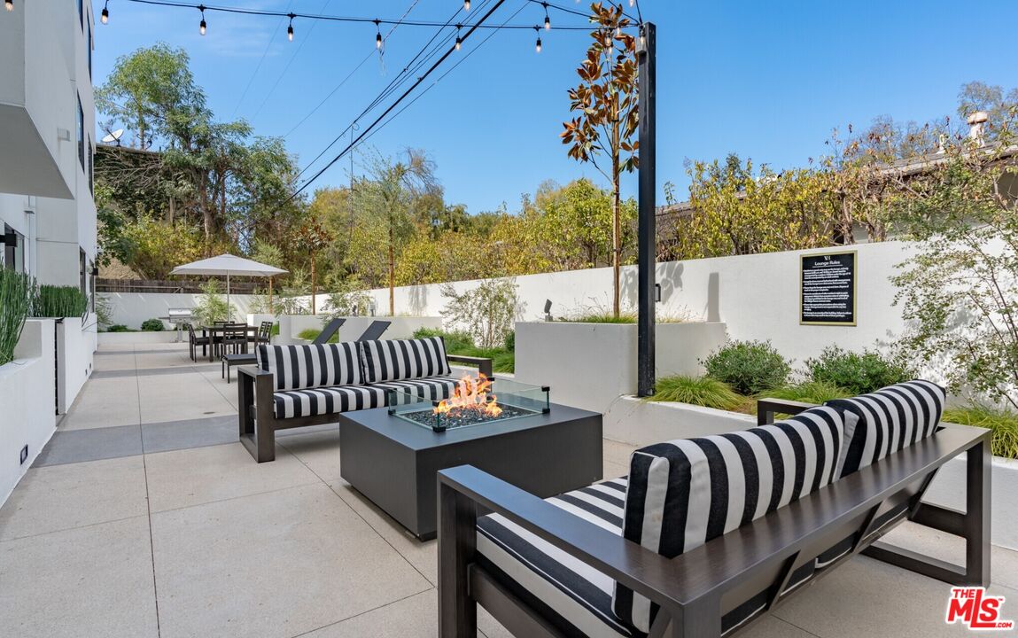 11445 Riverside Drive, Unit 101 North Hollywood, CA 91602 - Photo 18 of 21 a view of balcony with furniture