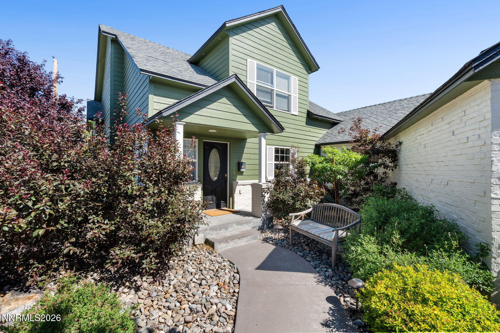 300 Country Club Drive Reno, NV 89509 - Photo 1 of 48 a front view of a house with garden
