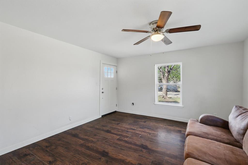 1805 Daniel Street Fort Worth, TX 76104 - Photo 16 of 38 a view of room with window and ceiling fan