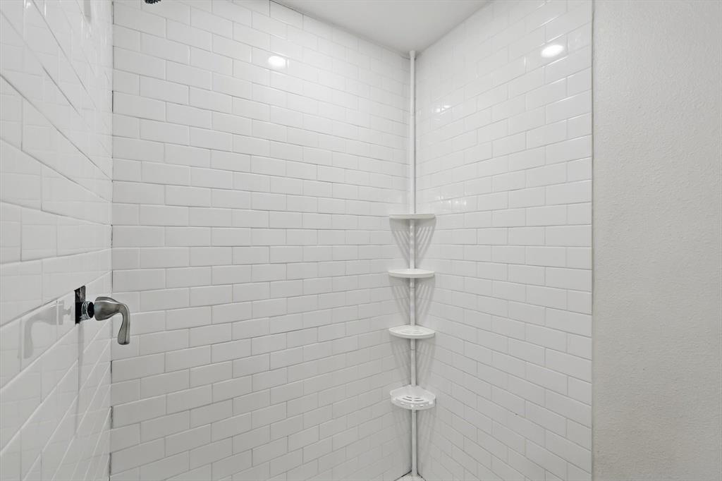 1805 Daniel Street Fort Worth, TX 76104 - Photo 27 of 38 a bathroom with a shower