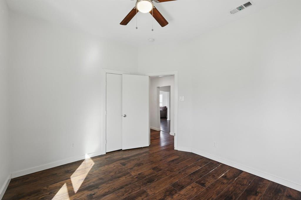 1805 Daniel Street Fort Worth, TX 76104 - Photo 31 of 38 a view of empty room with ceiling fan