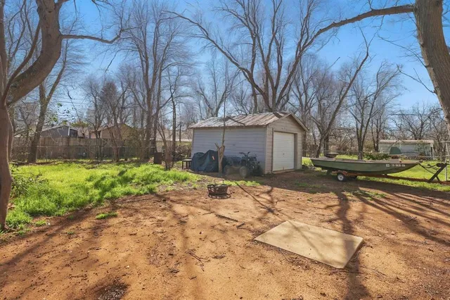 a view of a road with a building in the background