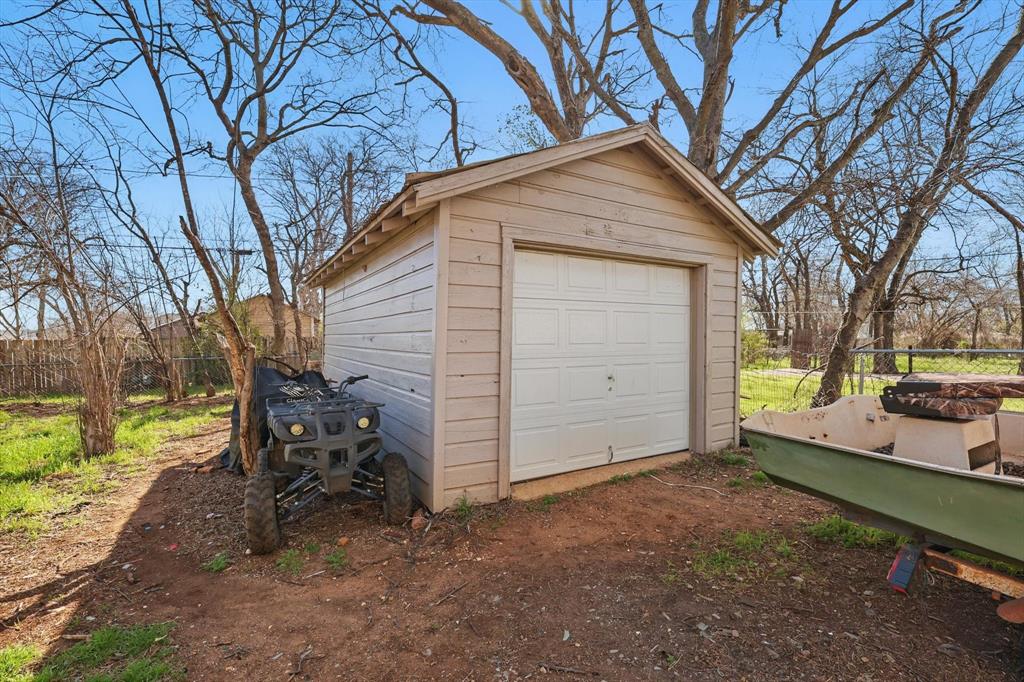 1805 Daniel Street Fort Worth, TX 76104 - Photo 37 of 38 a view of a house with a yard