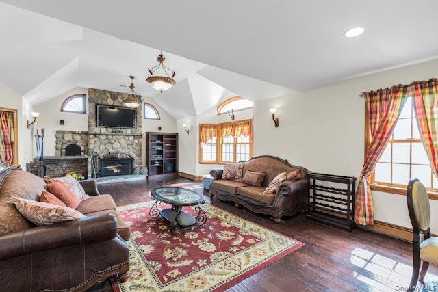 1509 Wad Riv Mnrvl Road Wading River, NY 11792 - Photo 11 of 19 a living room with furniture a fireplace and a chandelier