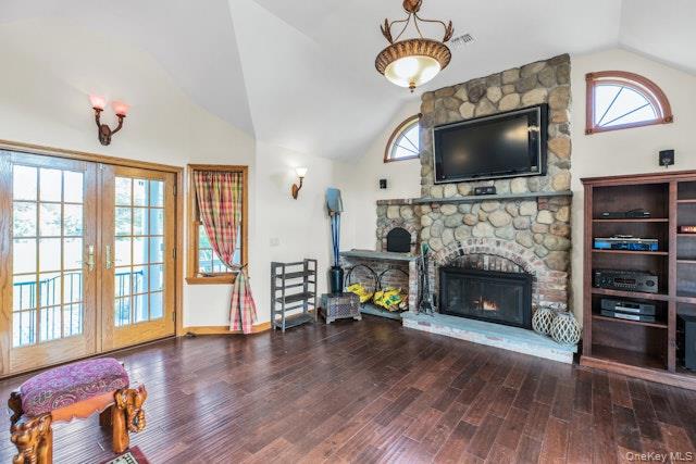 1509 Wad Riv Mnrvl Road Wading River, NY 11792 - Photo 12 of 19 a living room with fireplace furniture flat screen tv and wooden floor