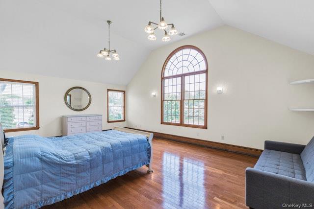 1509 Wad Riv Mnrvl Road Wading River, NY 11792 - Photo 13 of 19 a bedroom with bed and a window