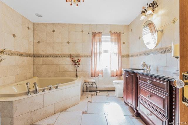 1509 Wad Riv Mnrvl Road Wading River, NY 11792 - Photo 16 of 19 a spacious bathroom with a bathtub a sink and a large mirror