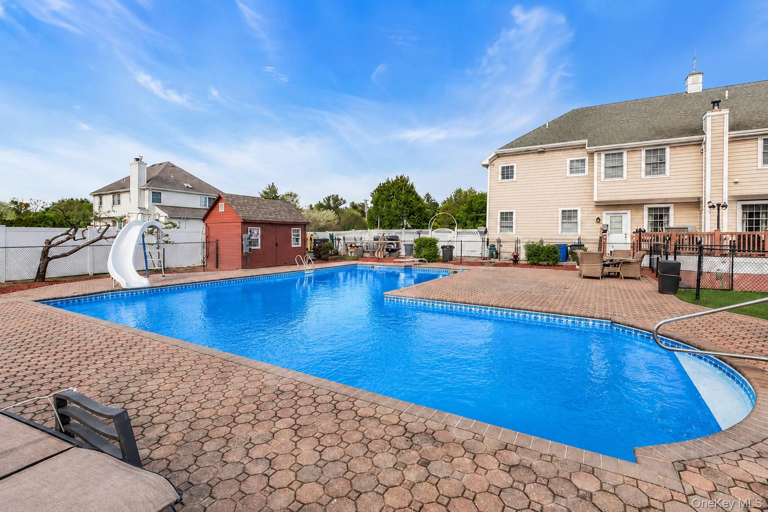 1509 Wad Riv Mnrvl Road Wading River, NY 11792 - Photo 7 of 19 a view of a house with swimming pool