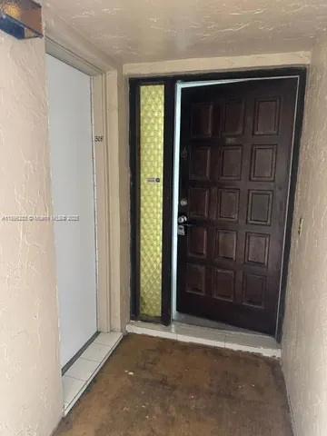 an empty room with a door