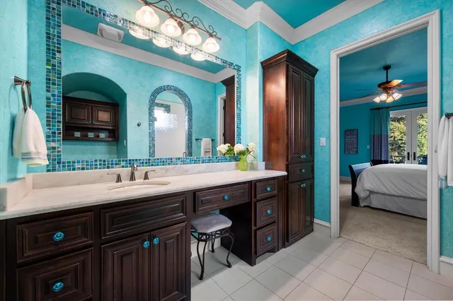 a bathroom with a double vanity sink and a mirror