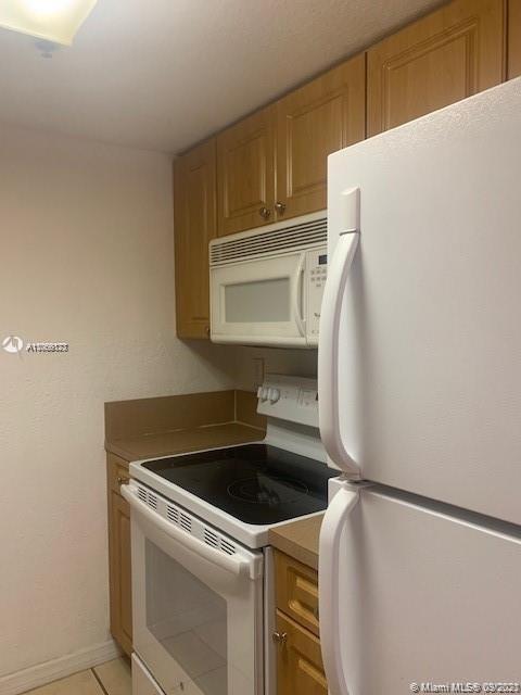 637 Southwest 3rd Street, Unit 206 Miami, FL 33130 - Photo 12 of 20 a utility room with dryer and washer
