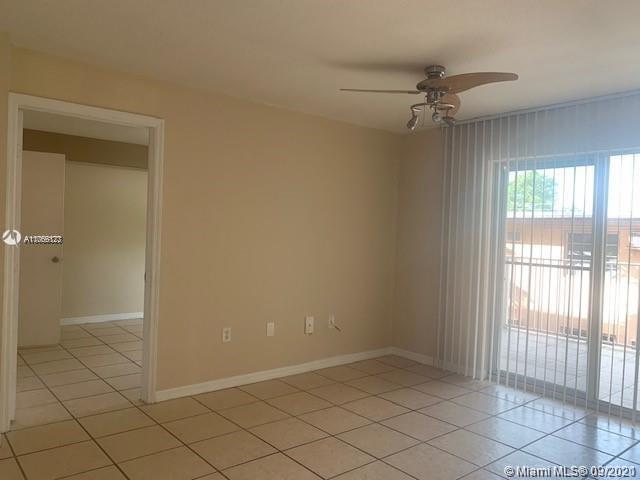 637 Southwest 3rd Street, Unit 206 Miami, FL 33130 - Photo 14 of 20 a view of an empty room and window