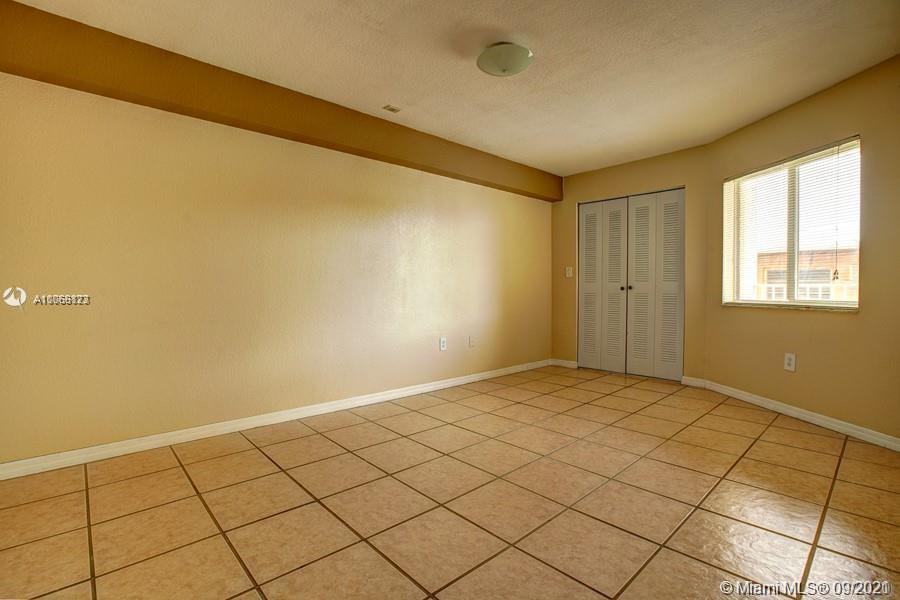 637 Southwest 3rd Street, Unit 206 Miami, FL 33130 - Photo 17 of 20 a view of an empty room and window