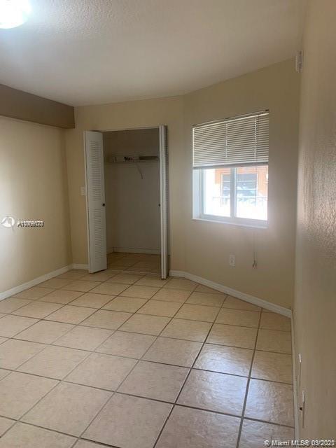 637 Southwest 3rd Street, Unit 206 Miami, FL 33130 - Photo 8 of 20 a view of an empty room with a window