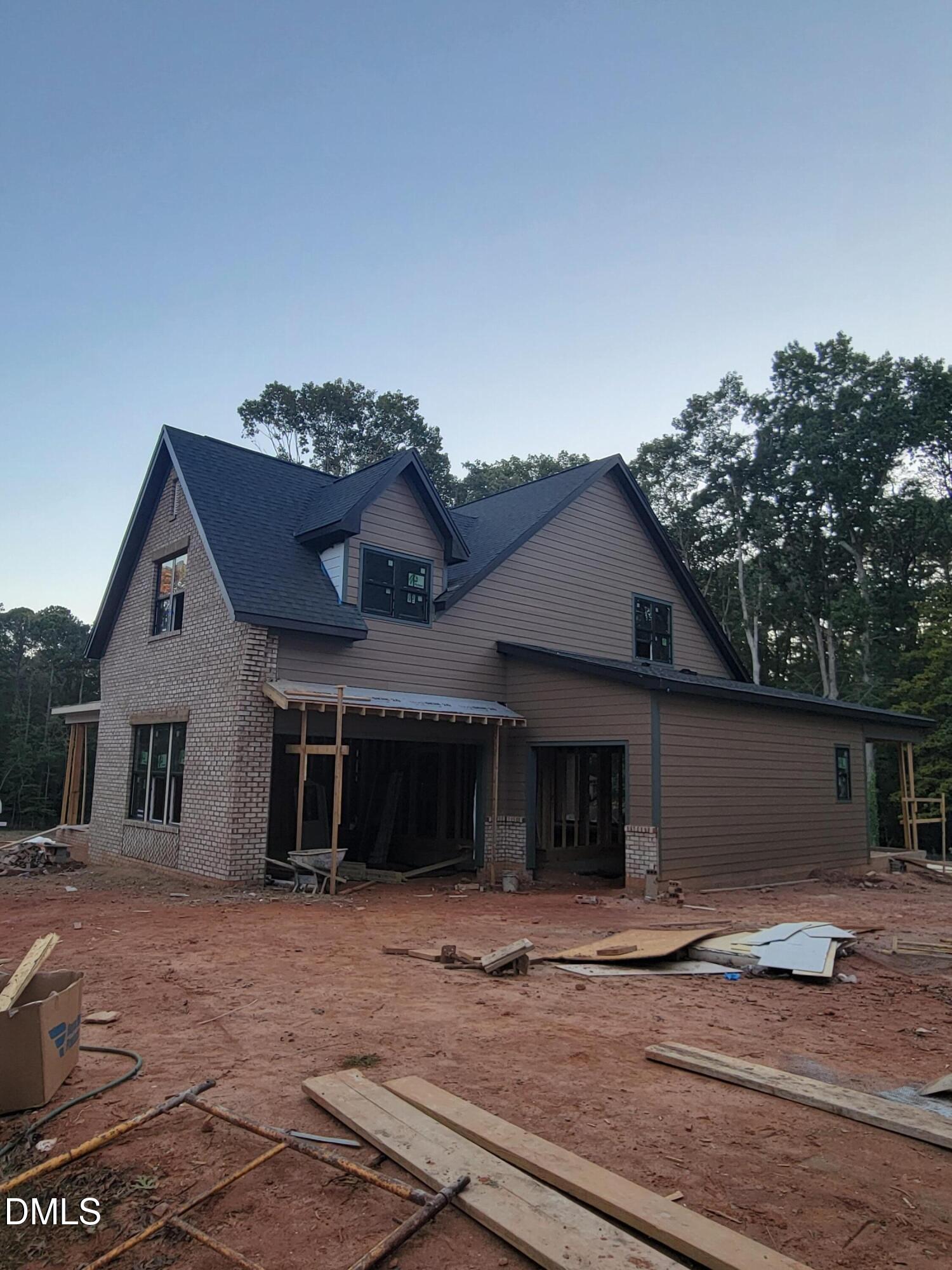 8717 Little Deer Lane Raleigh, NC 27613 - Photo 2 of 6 a view of a house with a entertaining space