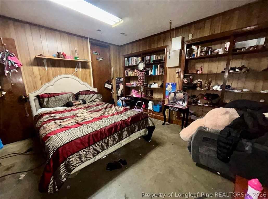 918 Opal Road Red Springs, NC 28377 - Photo 4 of 26 a bed room with a bed and a couch