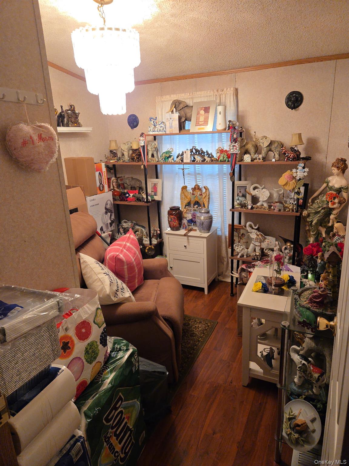 2701 Goethals Road North, Unit H4 Staten Island, NY 10303 - Photo 9 of 14 a bed room with a bed and a couch