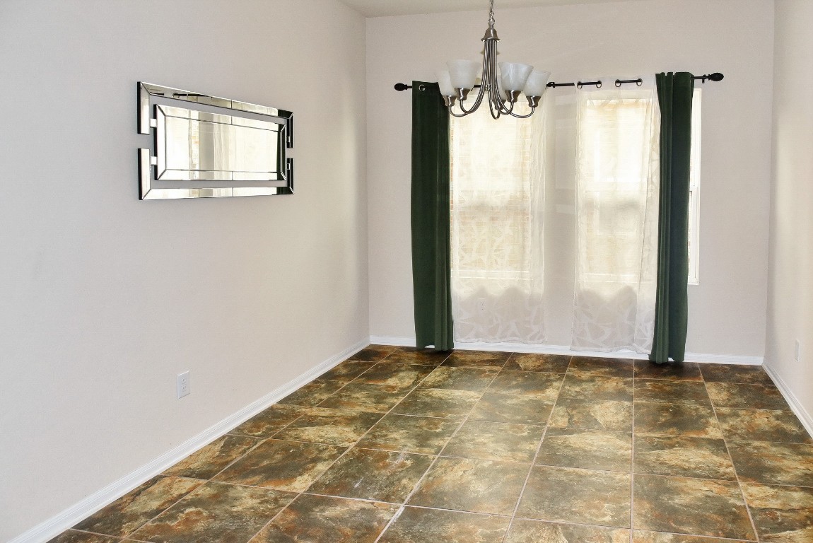19211 Side Way Tomball, TX 77375 - Photo 12 of 36 a view of a room with a window