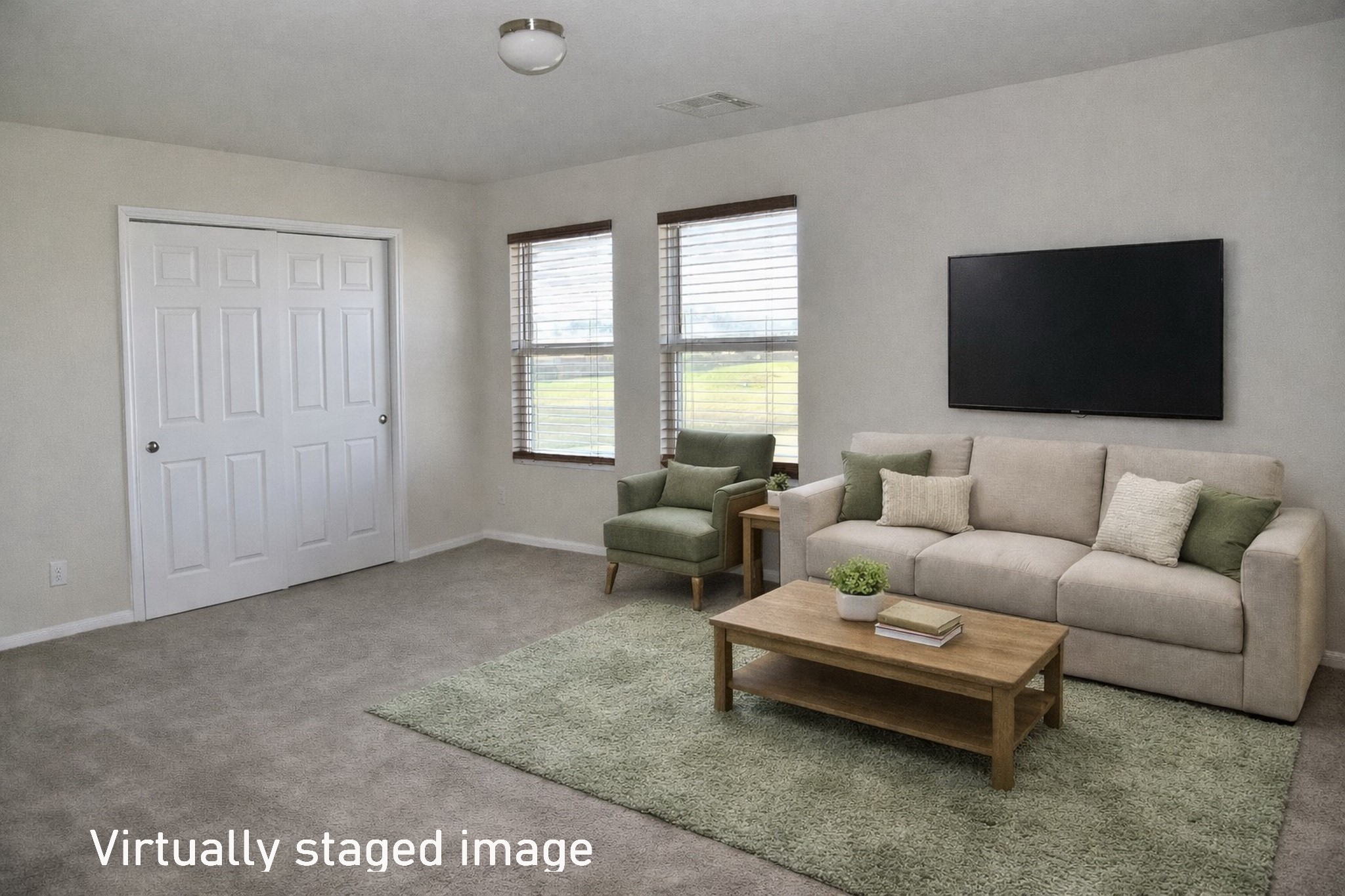19211 Side Way Tomball, TX 77375 - Photo 23 of 36 a living room with furniture and a flat screen tv