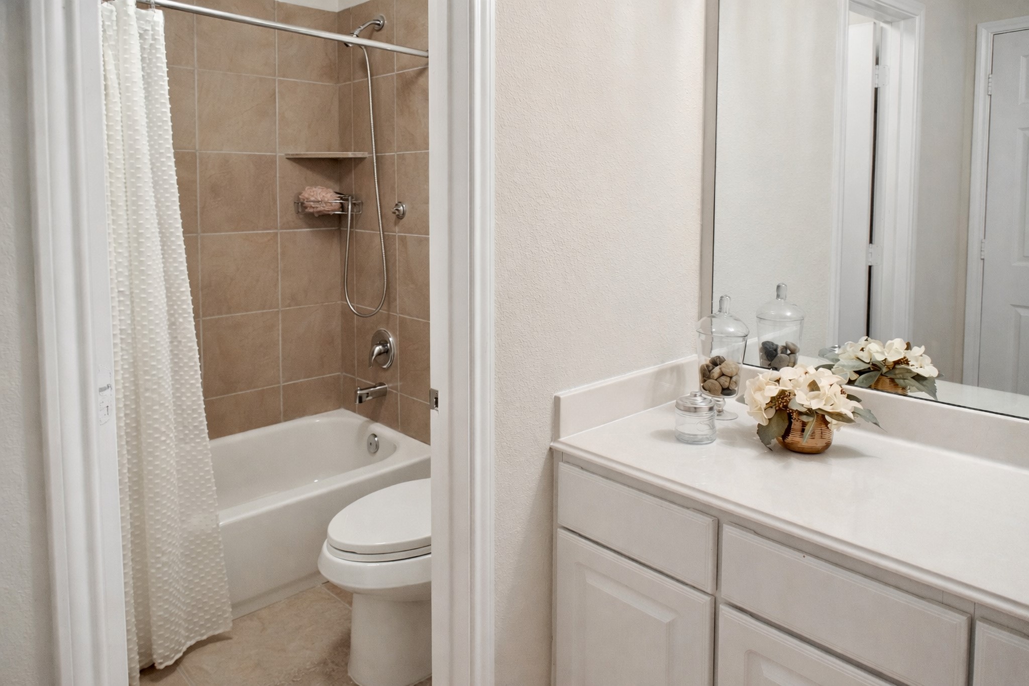 19211 Side Way Tomball, TX 77375 - Photo 32 of 36 a bathroom with a sink a toilet and shower