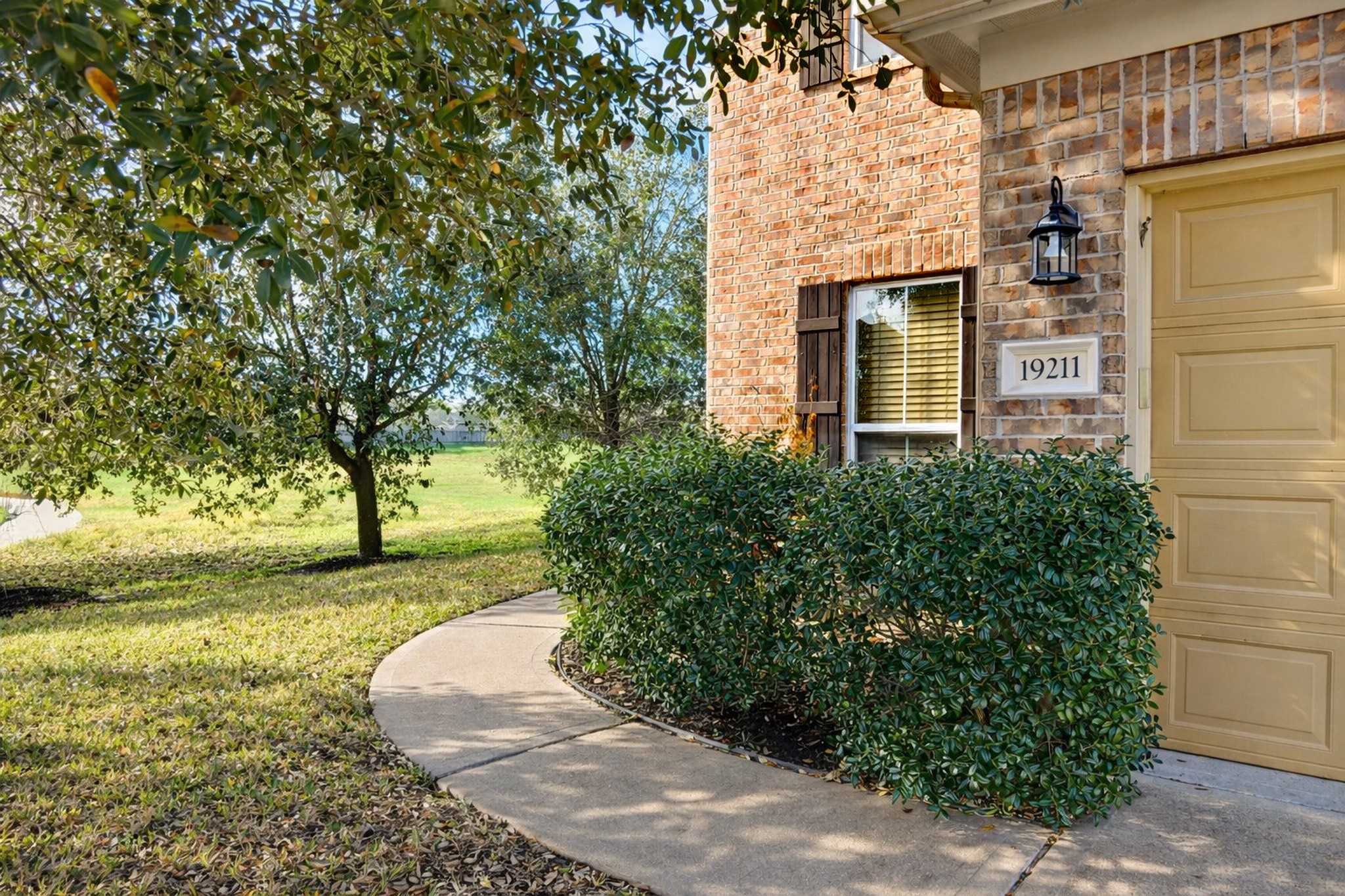 19211 Side Way Tomball, TX 77375 - Photo 4 of 36 a view of a yard in front of house
