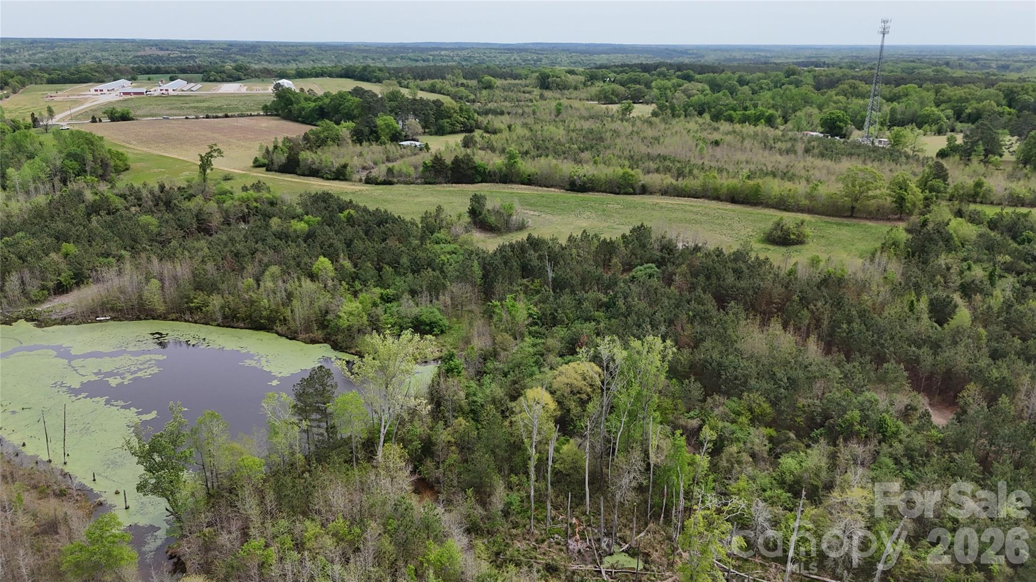 6377 Highway 52 Cheraw, SC 29520 - Photo 18 of 41 an aerial view of a houses with a yard and lake view