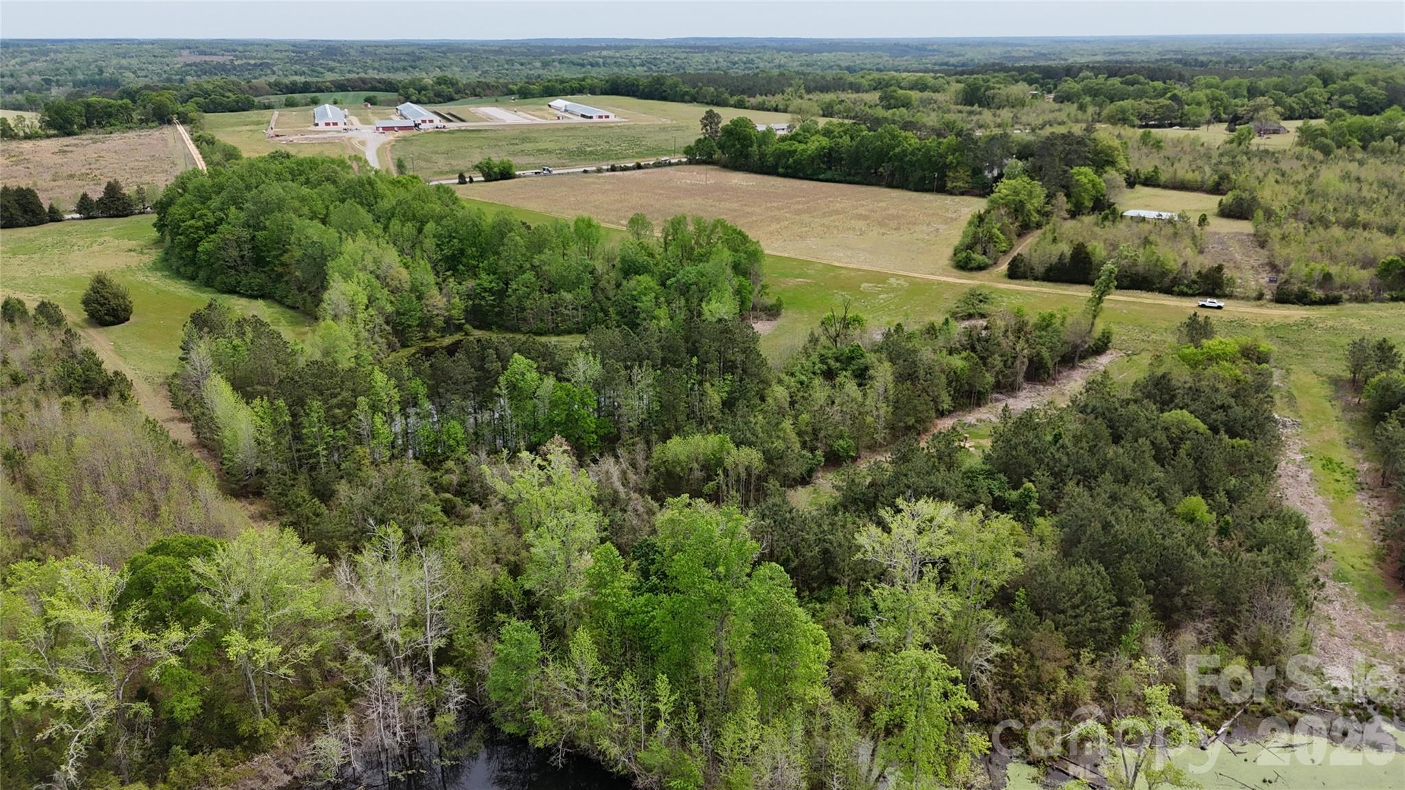6377 Highway 52 Cheraw, SC 29520 - Photo 20 of 41 an aerial view of lake with residential houses with outdoor space and trees