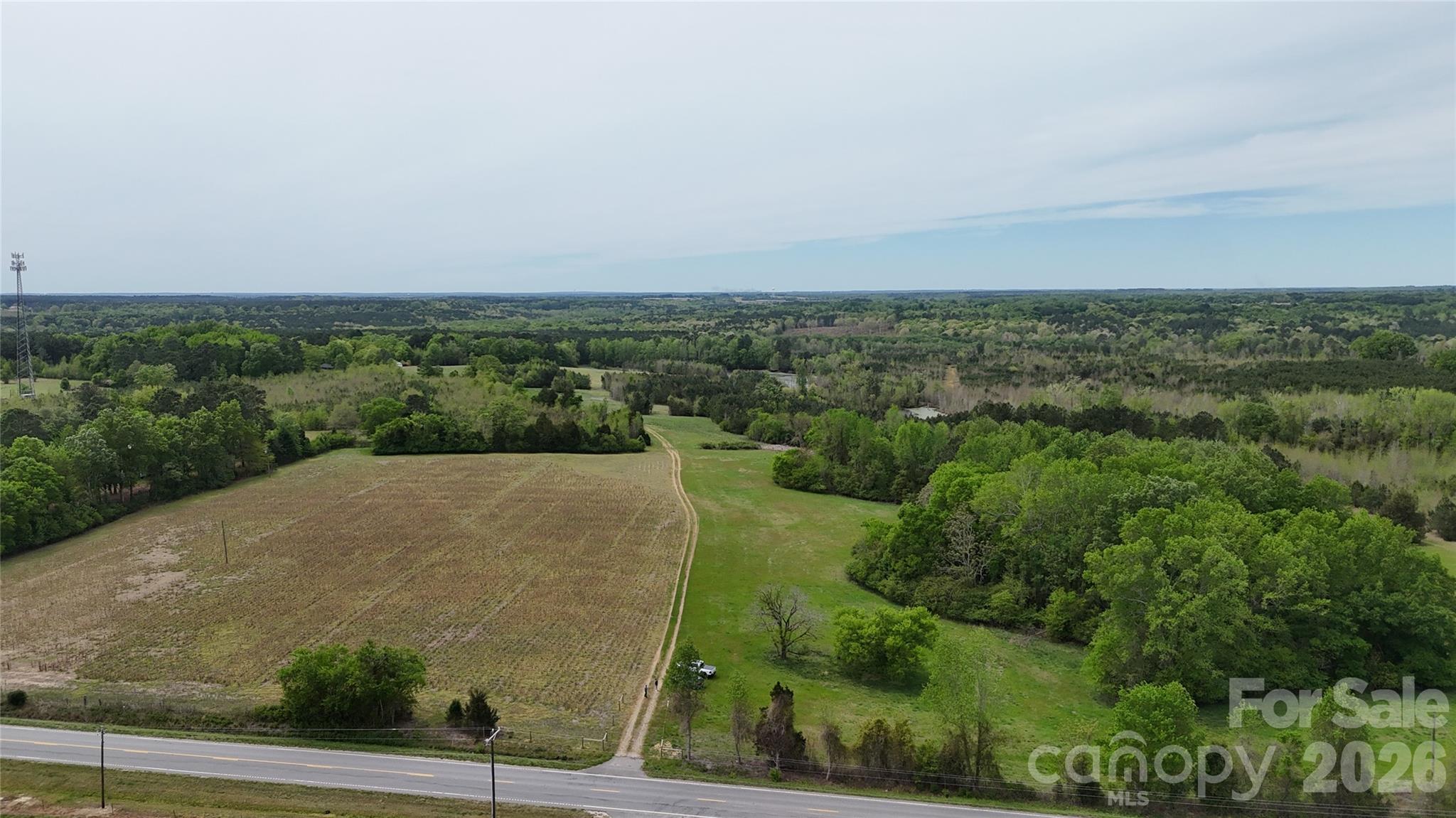6377 Highway 52 Cheraw, SC 29520 - Photo 2 of 41 an aerial view of a house with a yard