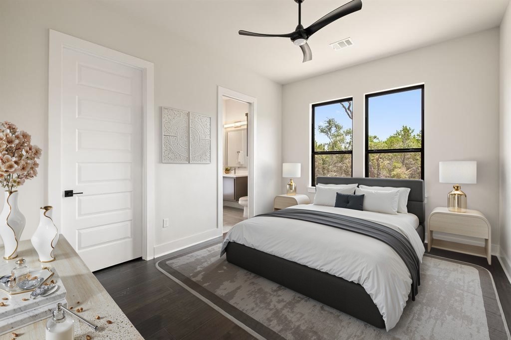 17809 Maritime Point Jonestown, TX 78645 - Photo 14 of 26 a bedroom with a large bed and a window