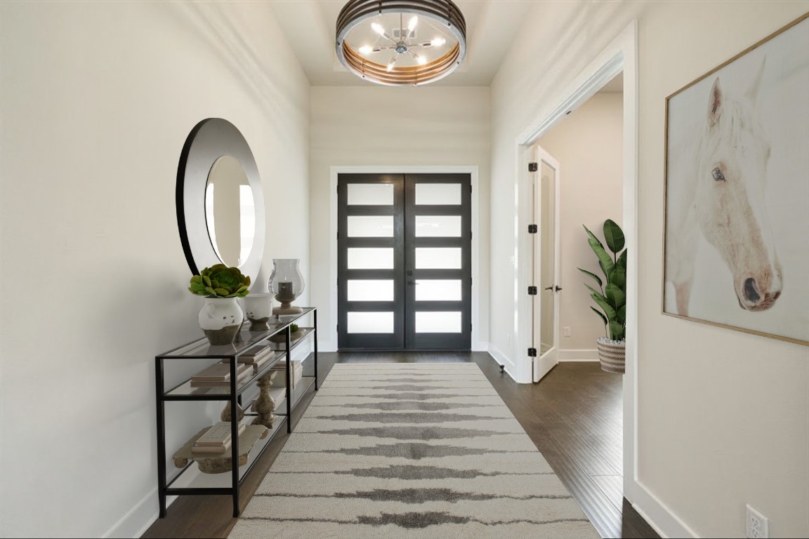 17809 Maritime Point Jonestown, TX 78645 - Photo 6 of 26 a view of a hallway with wooden floor and a mirror