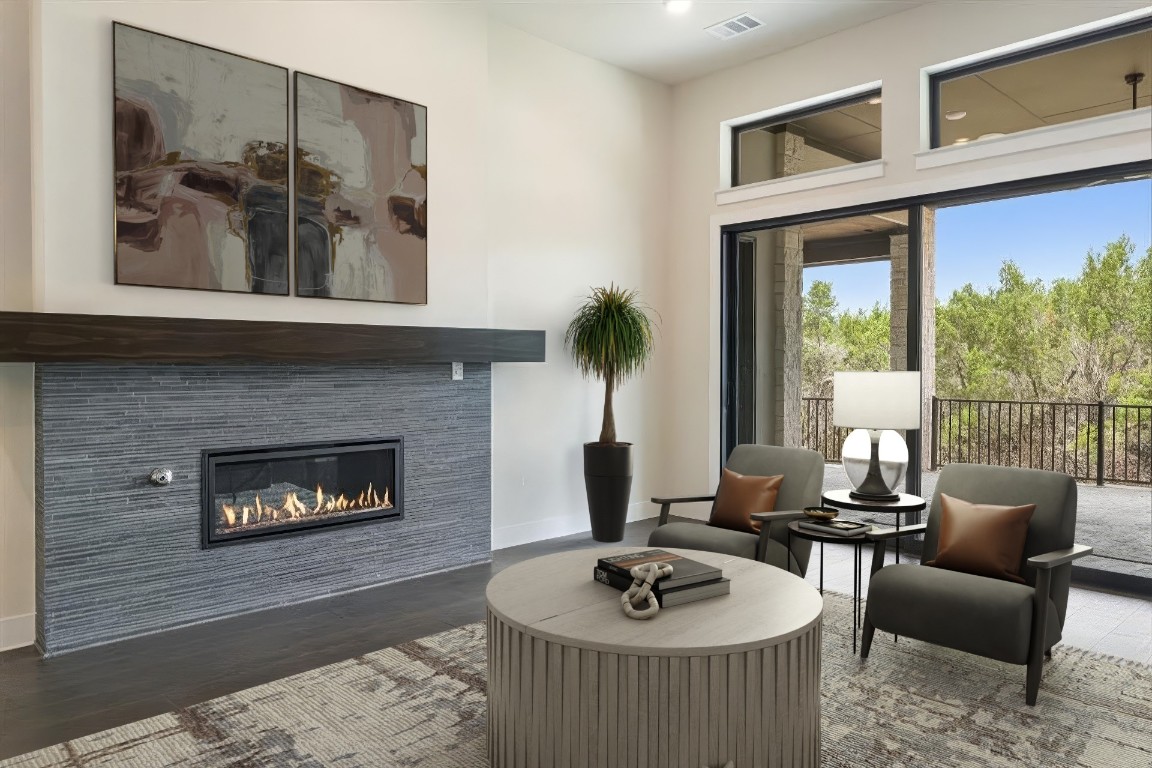 17809 Maritime Point Jonestown, TX 78645 - Photo 8 of 26 a living room with furniture and a fireplace