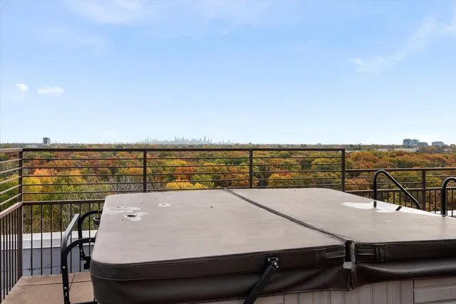 a view of roof with city view