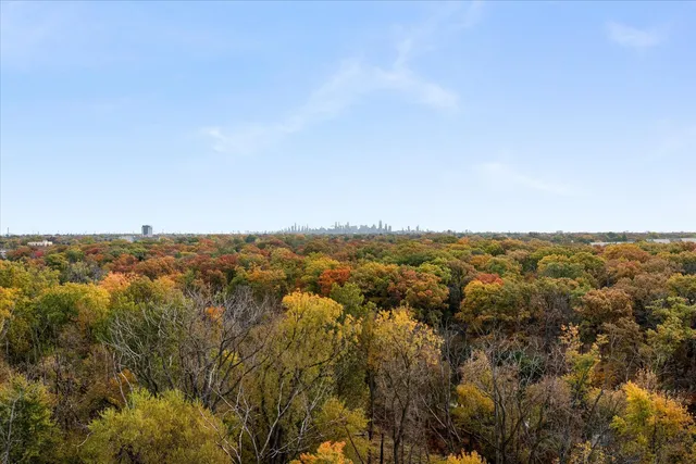 a shelf with books and knick knacks on it