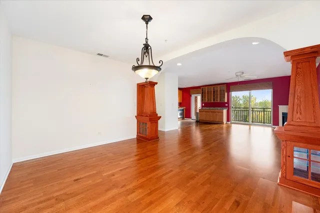 a view of a room with wooden floor portable swimming pool and outdoor space